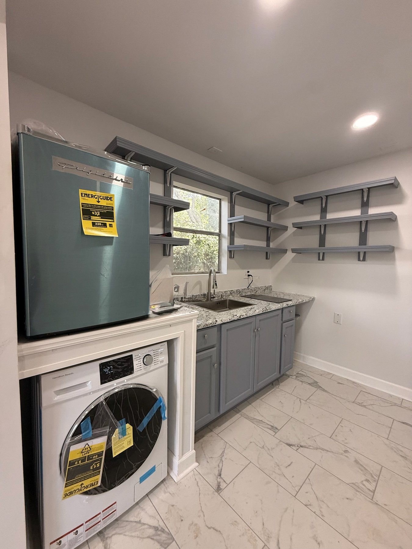 Kitchen and laundry area at Stonegate Studio